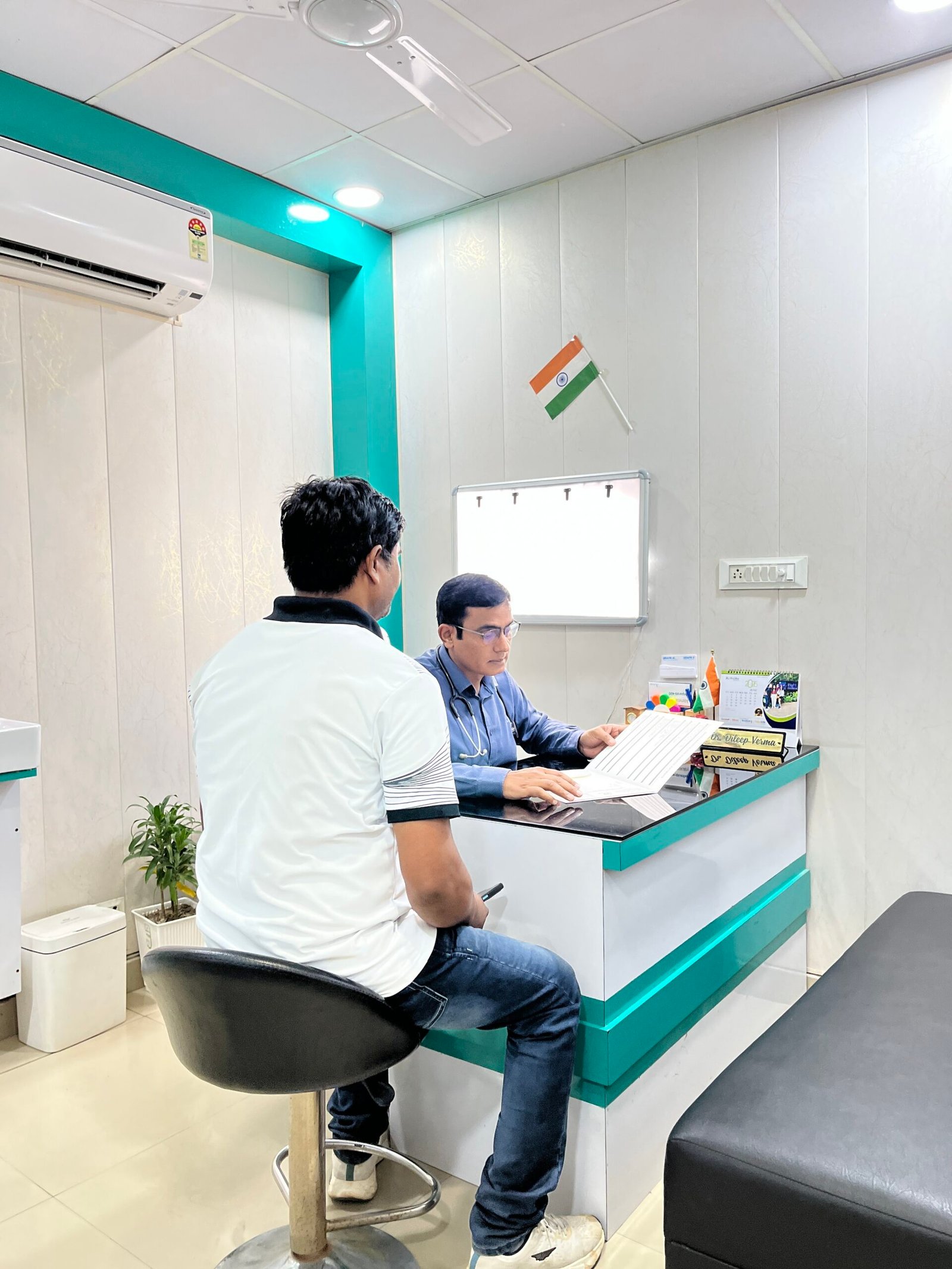 Dr. Dileep Verma with a diabetic patient